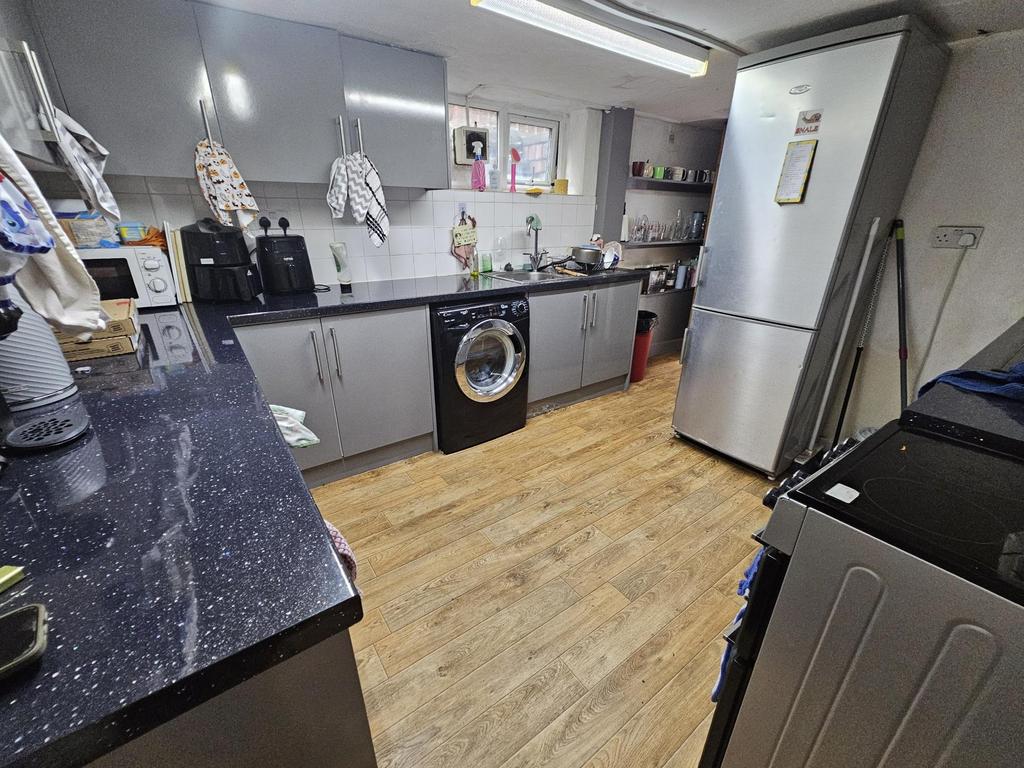 A modern, well-maintained kitchen area featurin...