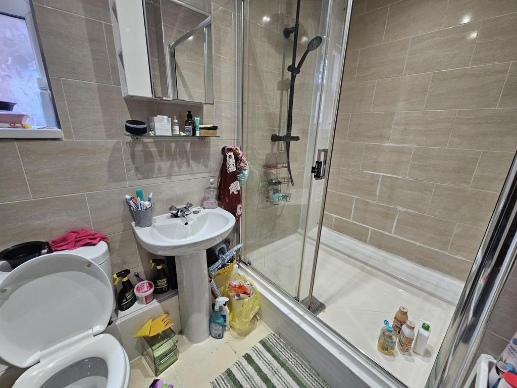 Modern bathroom with a shower enclosure, clean ...