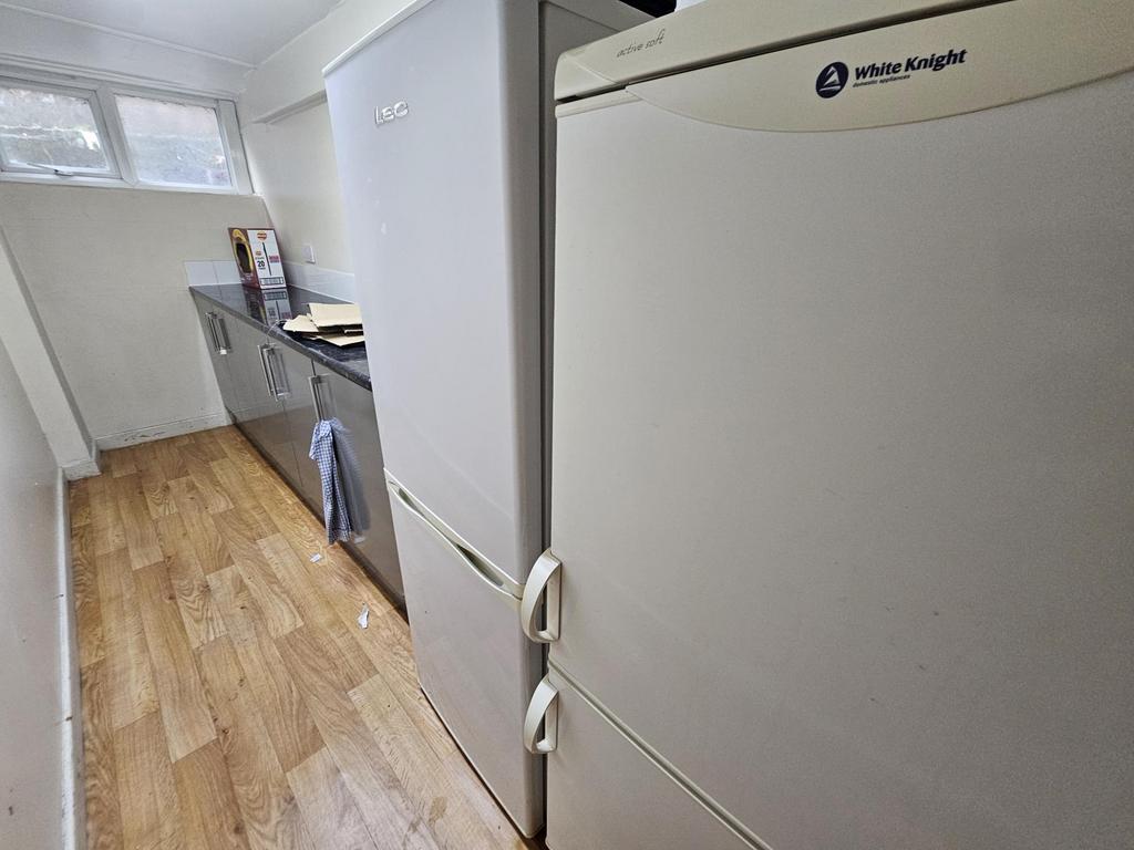 A clean and functional kitchen area with visibl...