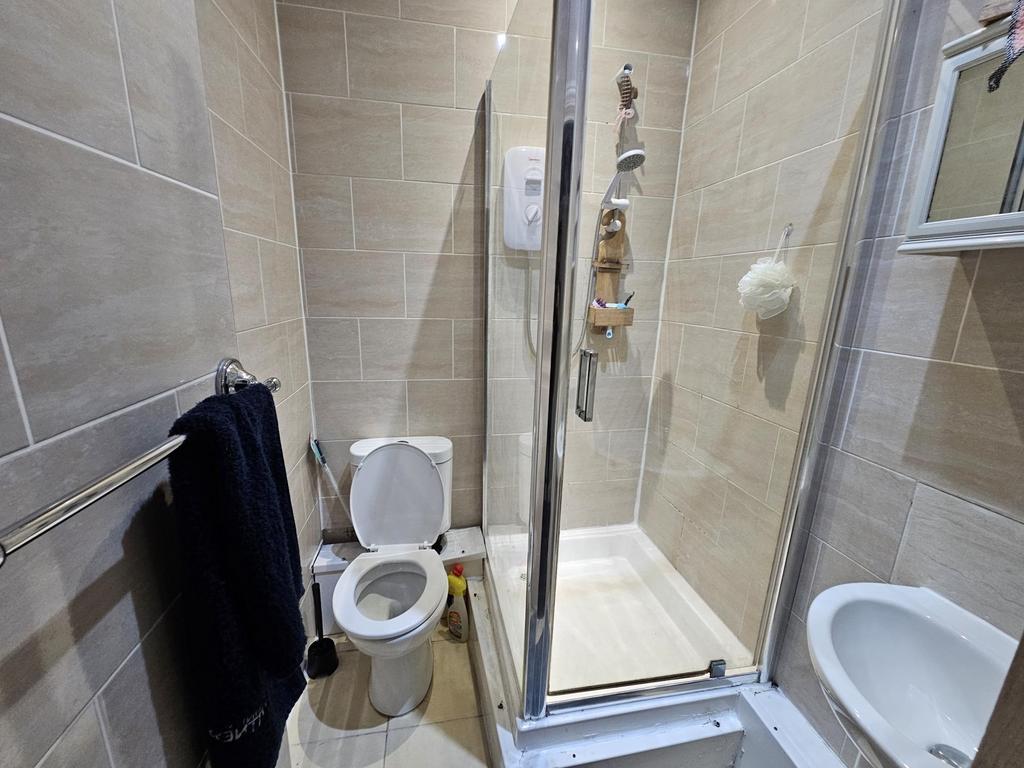 A clean and well-maintained bathroom featuring ...