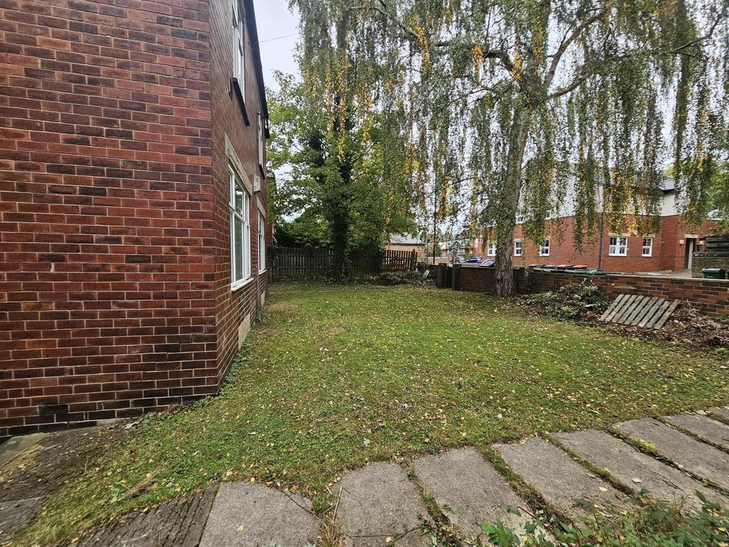 A welcoming view of the front yard showcasing a...