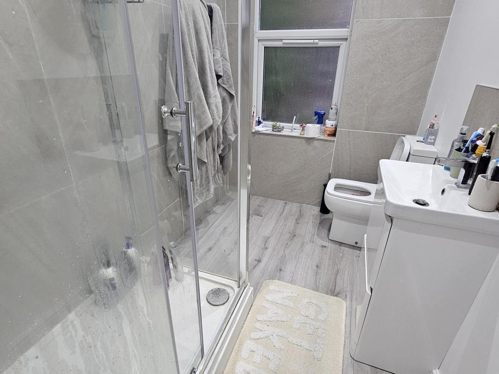 A modern, well-maintained bathroom featuring a ...