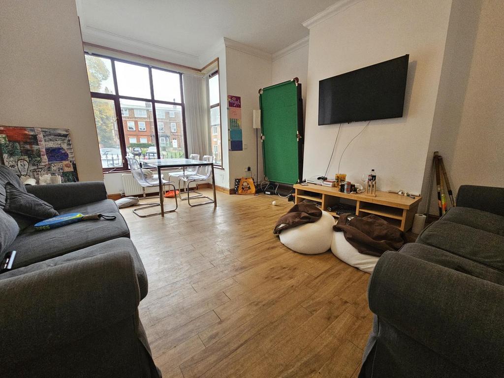A spacious and inviting living room with large ...
