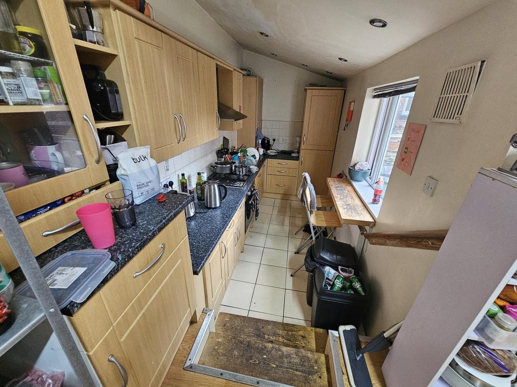 A functional kitchen area with ample counter sp...