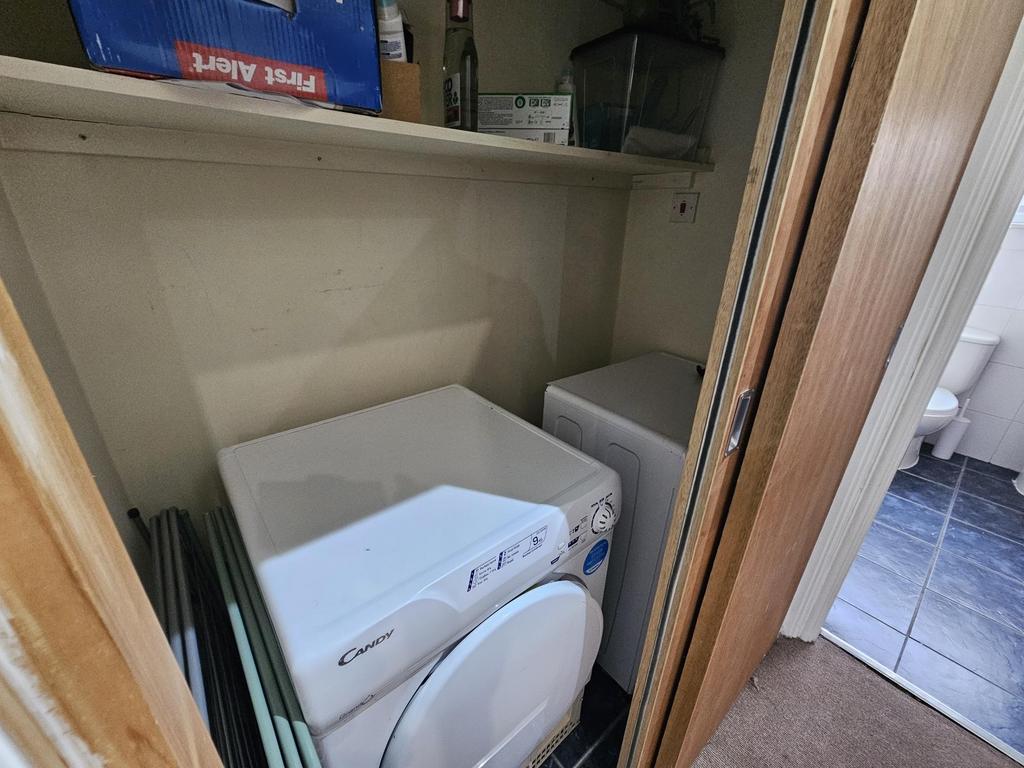A spacious and well-maintained bathroom with a ...