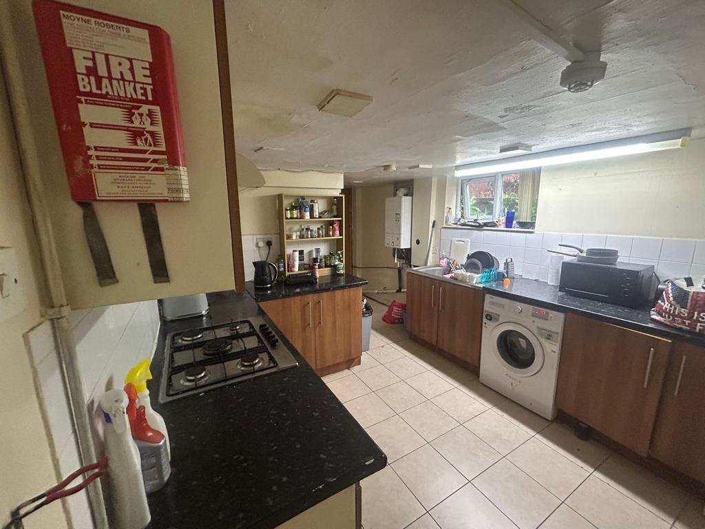 A well-maintained kitchen area featuring essent...