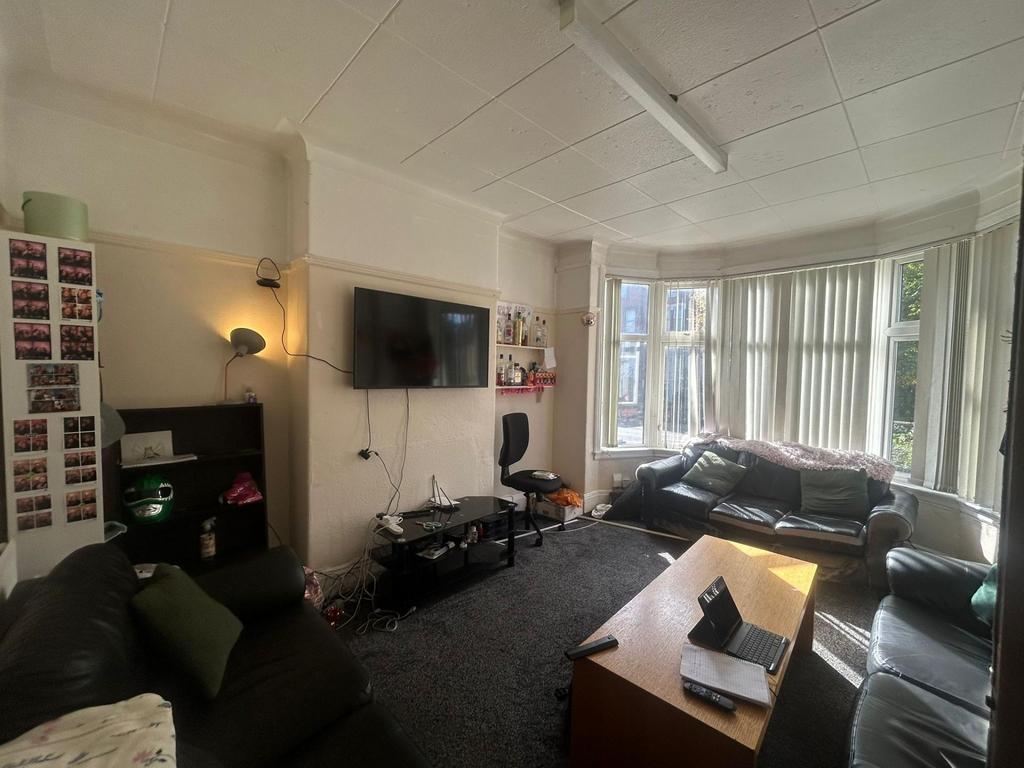 A spacious and inviting living room with large ...