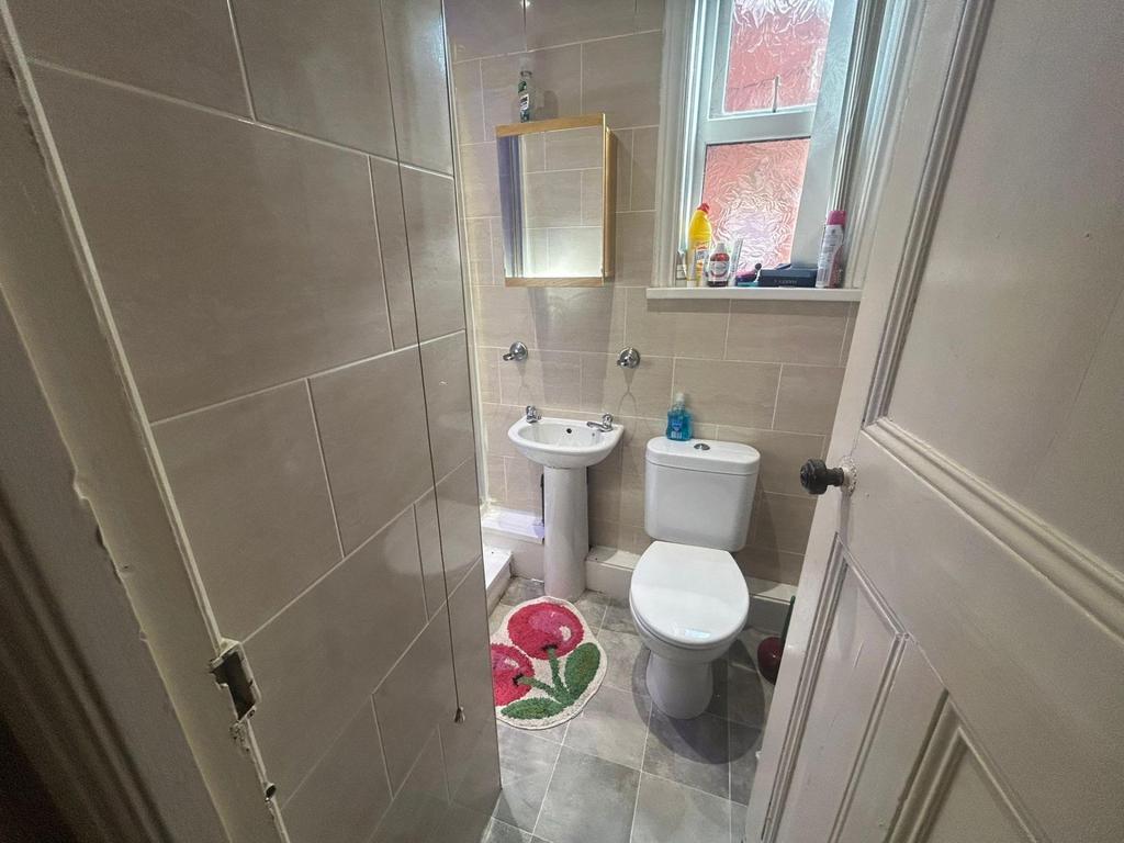 A clean and well-maintained bathroom featuring ...