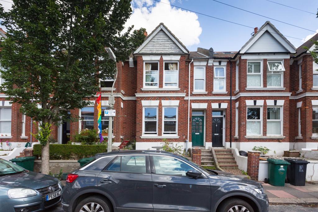 Attractive red-brick terraced house with bay wi...