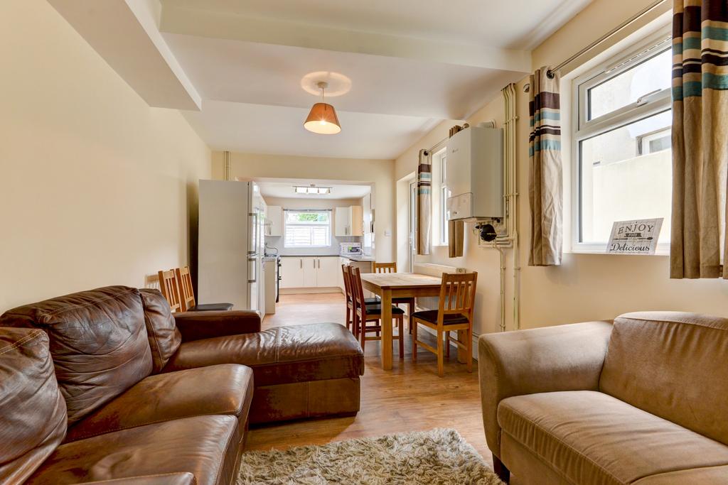 Spacious open-plan living area with comfortable...