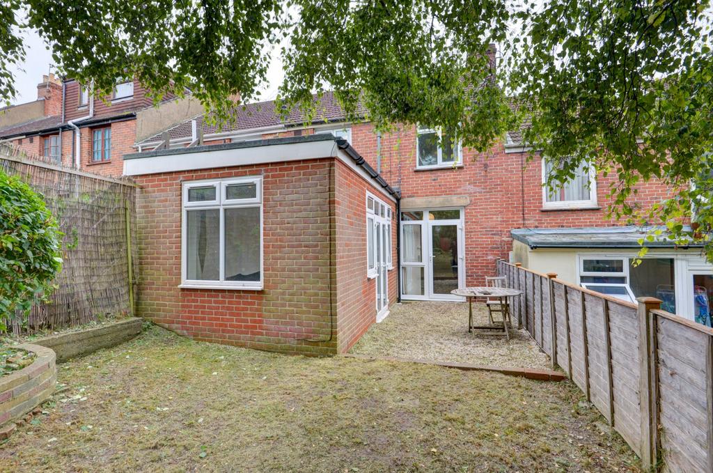 Exterior view of a brick property showcasing a ...