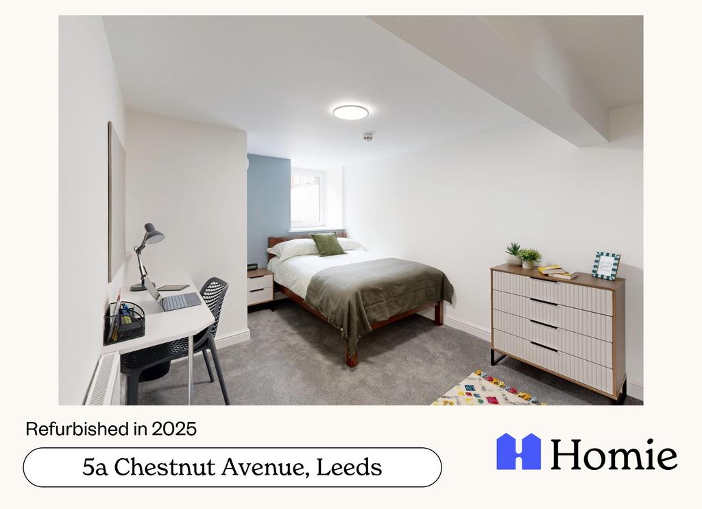 A spacious and well-lit master bedroom with a c...