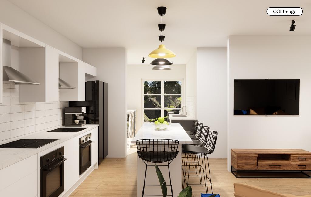 Bright modern kitchen with island dining...