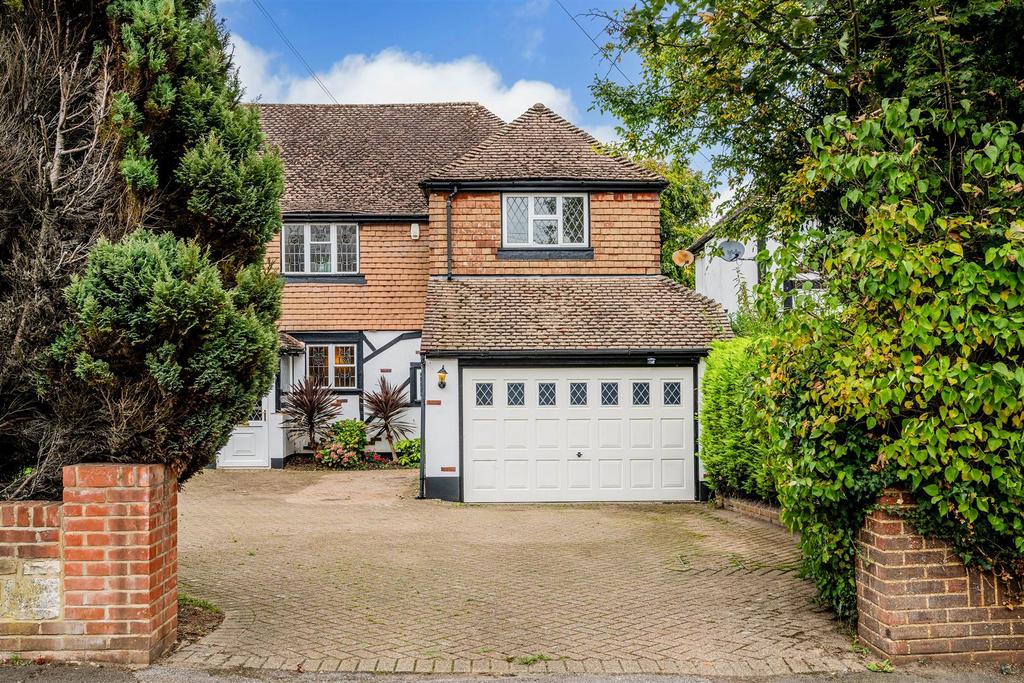 Detached house exterior, driveway, garage