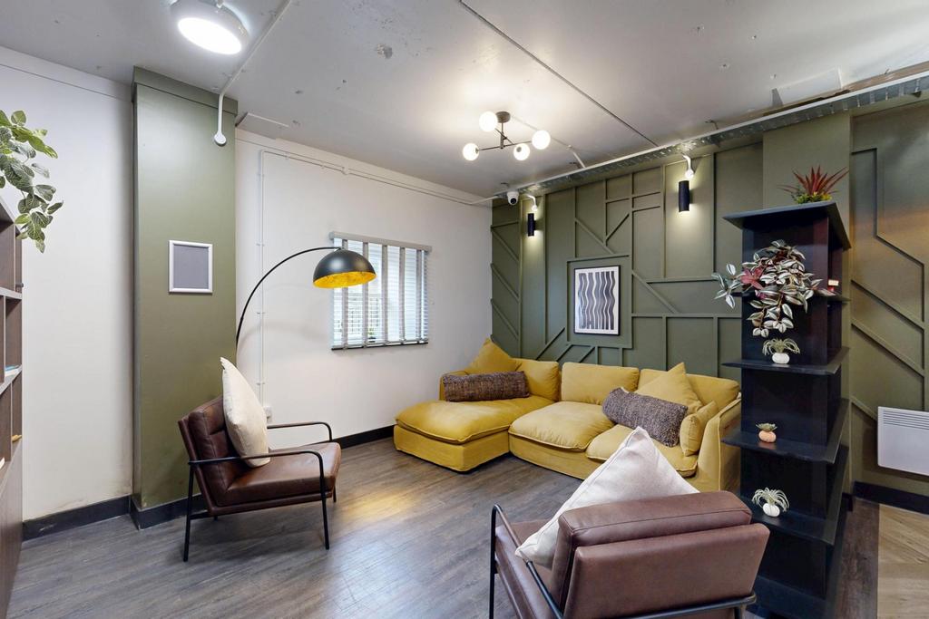 Contemporary living room with a stylish mustard...