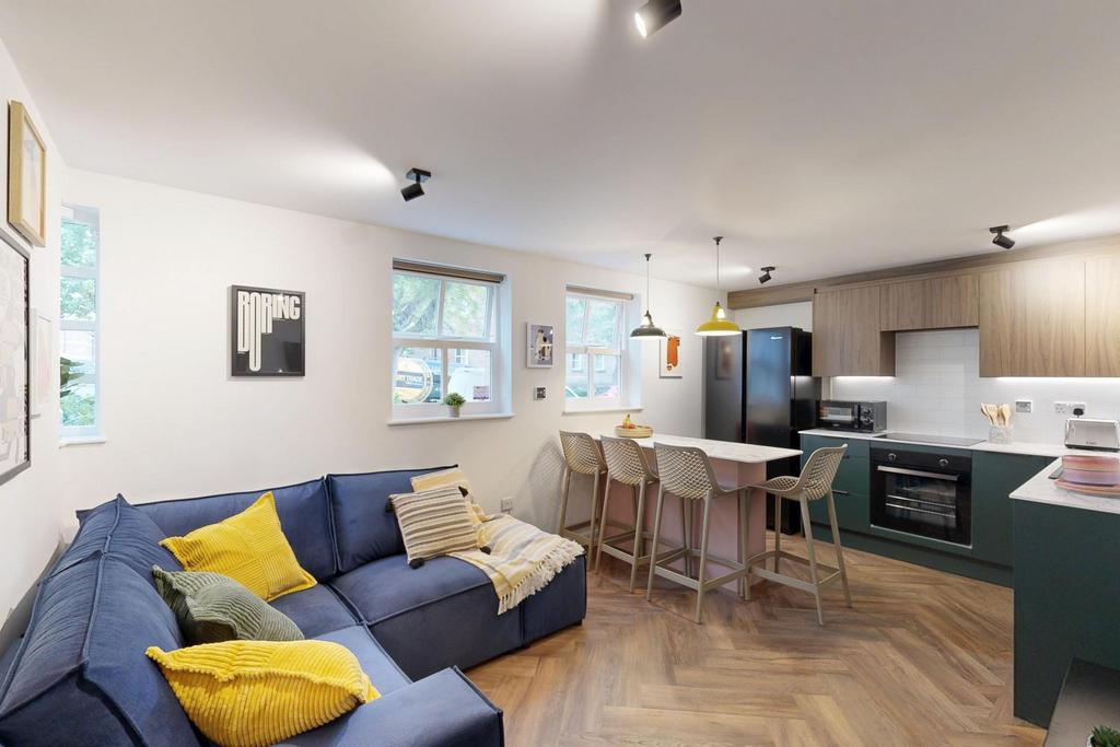 A modern and spacious living room filled with n...