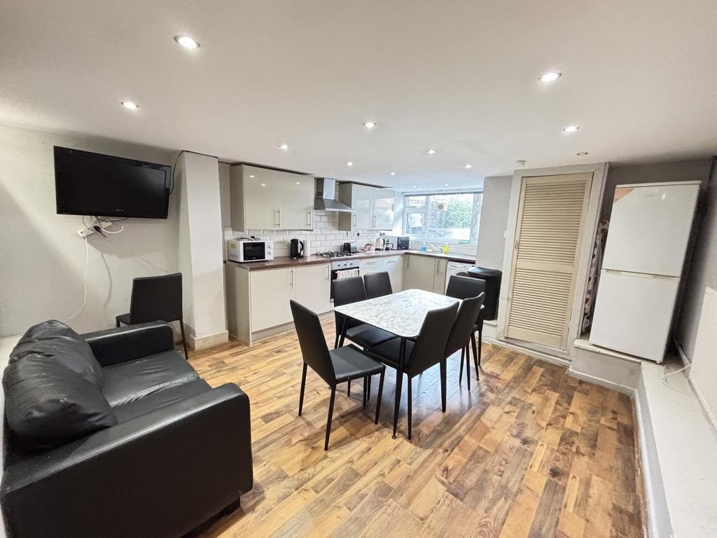 Modern and bright living room with ample natura...