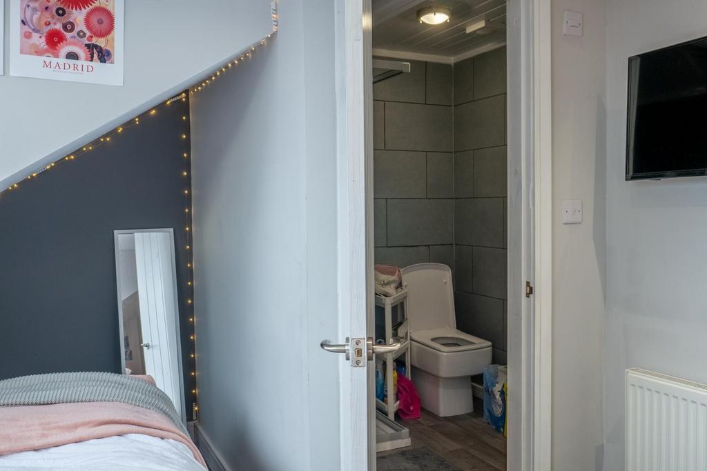 A clean and well-maintained bathroom with moder...
