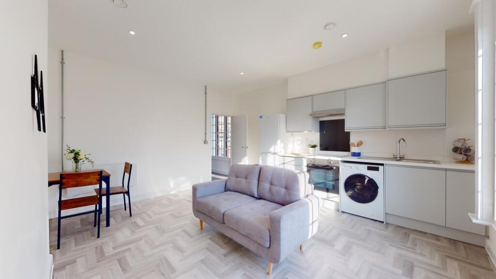 A bright and spacious contemporary living room ...