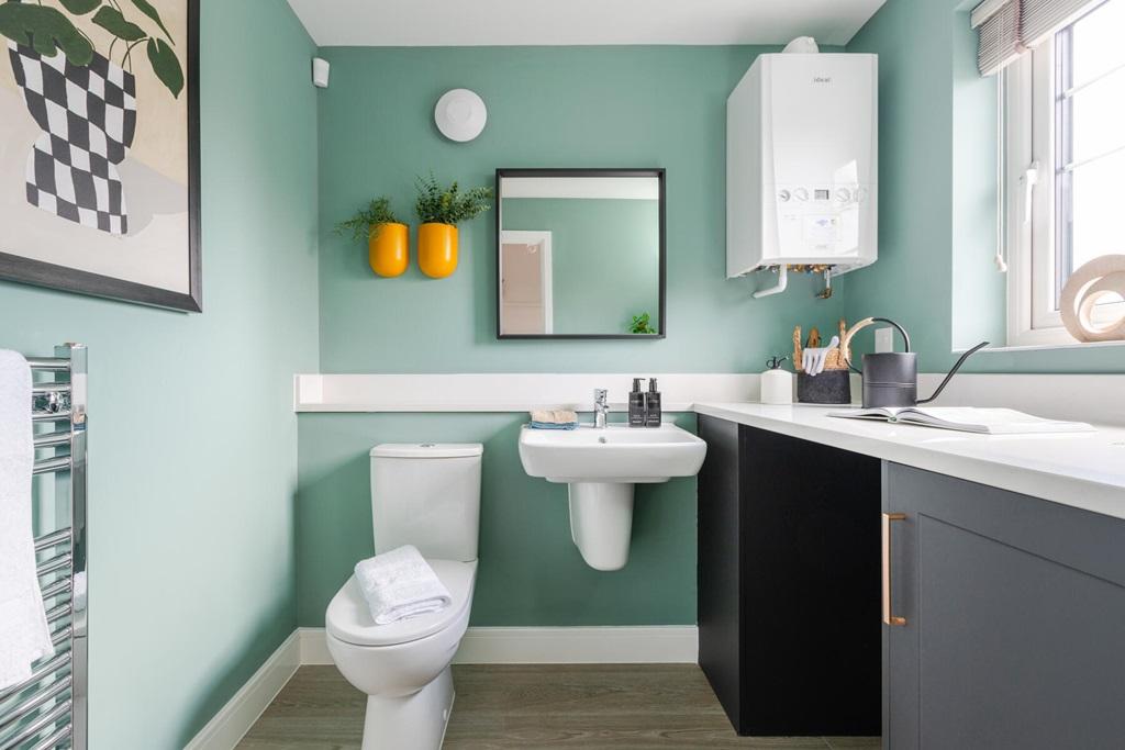 A downstairs cloakroom and utility adds...