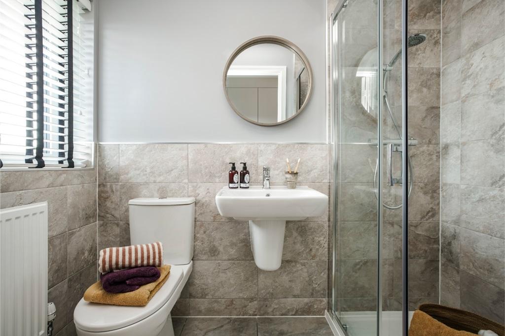 A generous ensuite shower room connected to the...