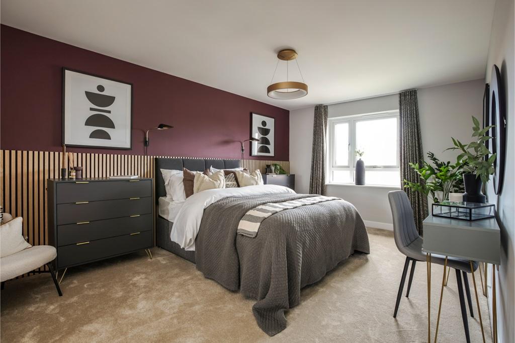 A luxurious main bedroom that stretches the...