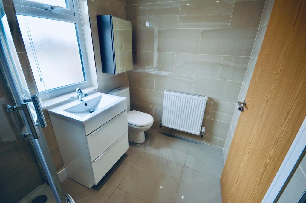 A clean and well-maintained bathroom with a mod...