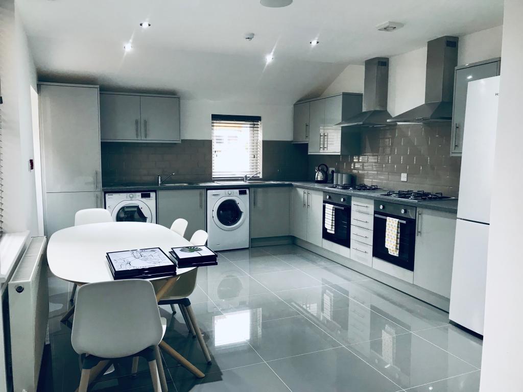 A modern and well-maintained kitchen featuring ...