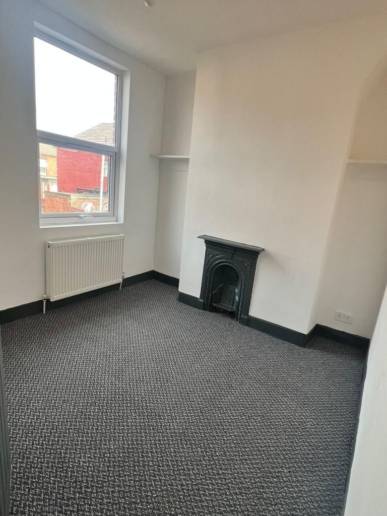 A bright, well-maintained living space featurin...