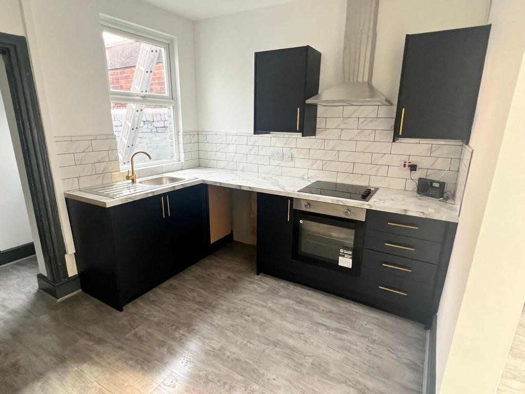 Modern and clean kitchen with ample counter spa...