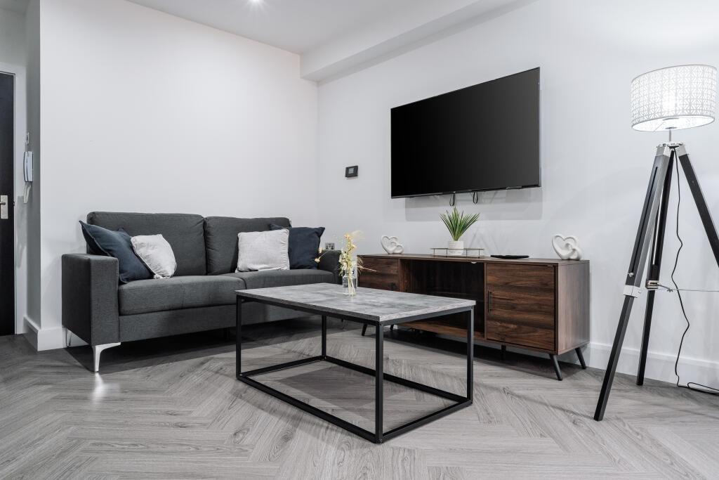 Modern and stylish living room featuring a larg...