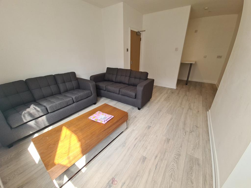 Bright and welcoming living room featuring two ...