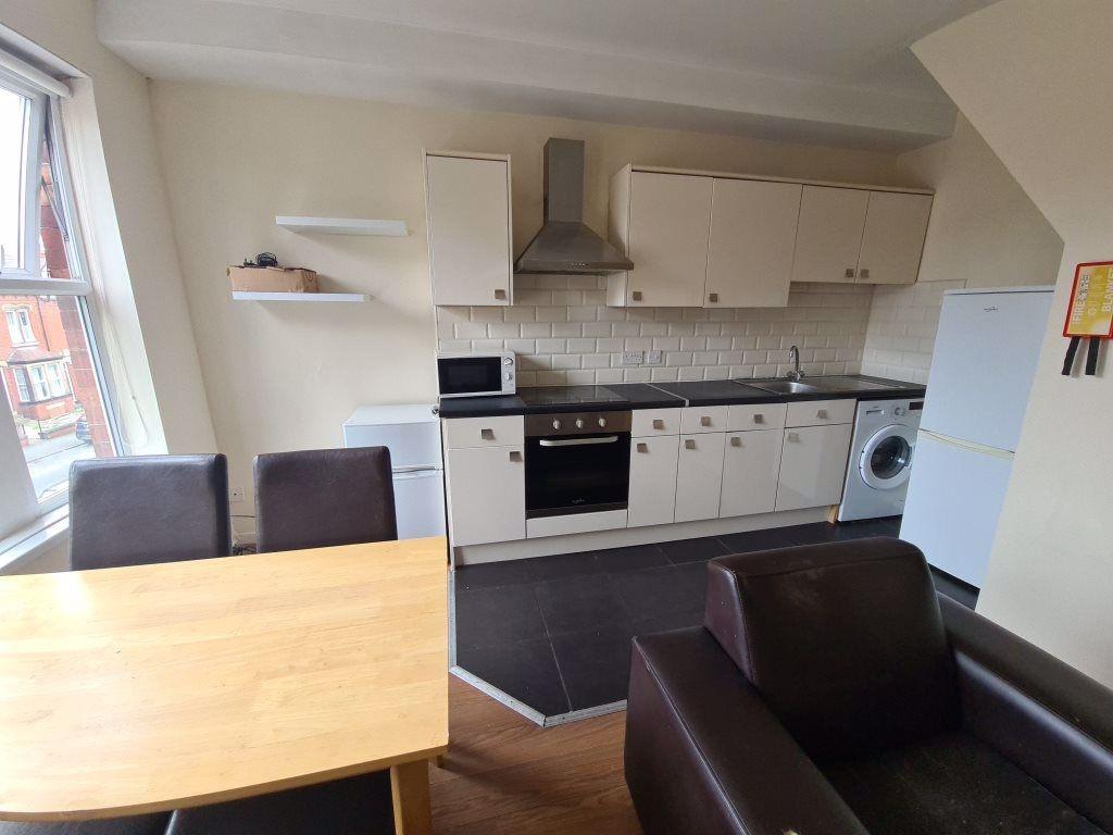 Bright and well-maintained kitchen featuring mo...