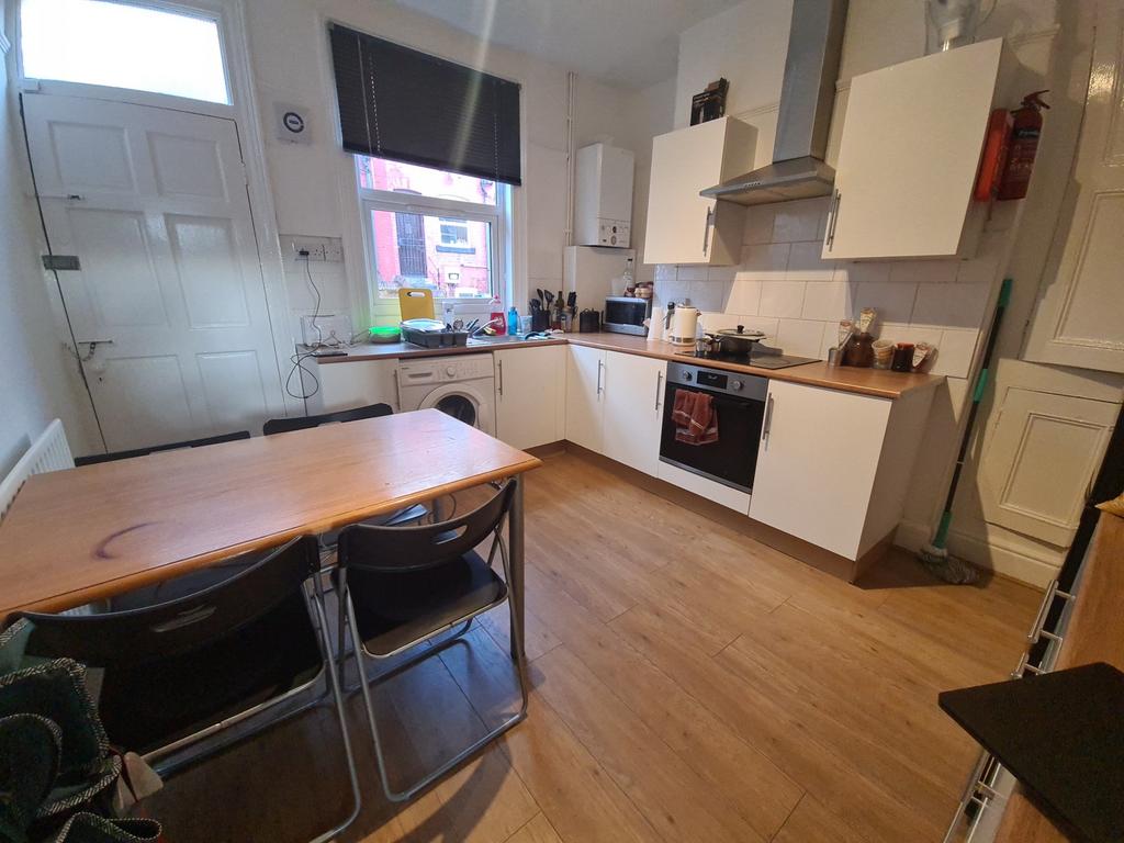 A bright and functional kitchen with ample coun...