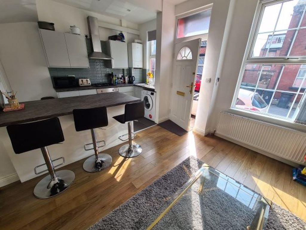 Bright and modern kitchen featuring a spacious ...