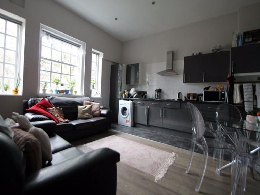 A bright and stylish contemporary living room f...
