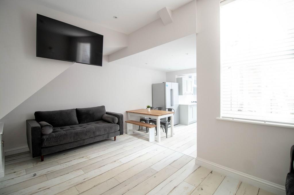 Bright and airy living space featuring a modern...