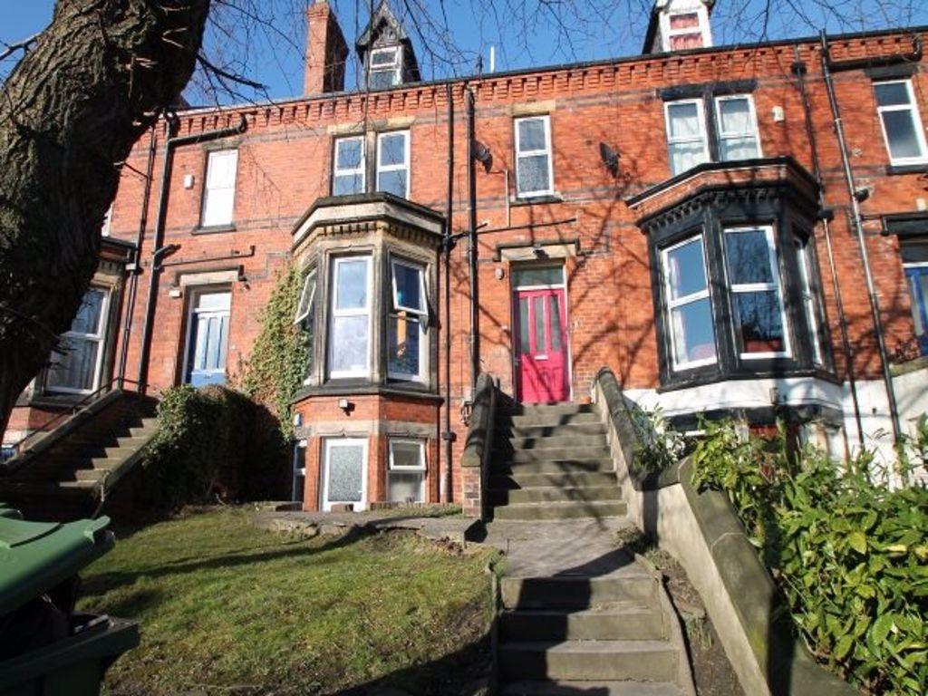 A charming exterior shot of a classic terraced ...