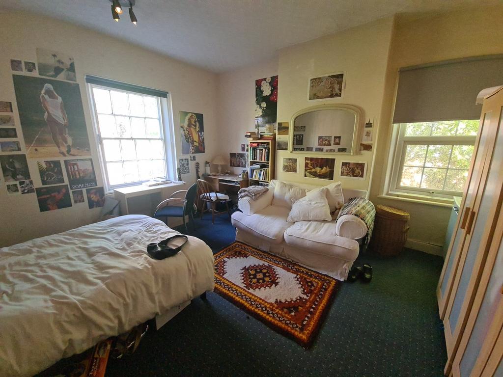 A cozy and inviting living room filled with nat...