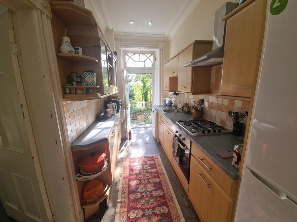 A well-maintained kitchen with natural light st...