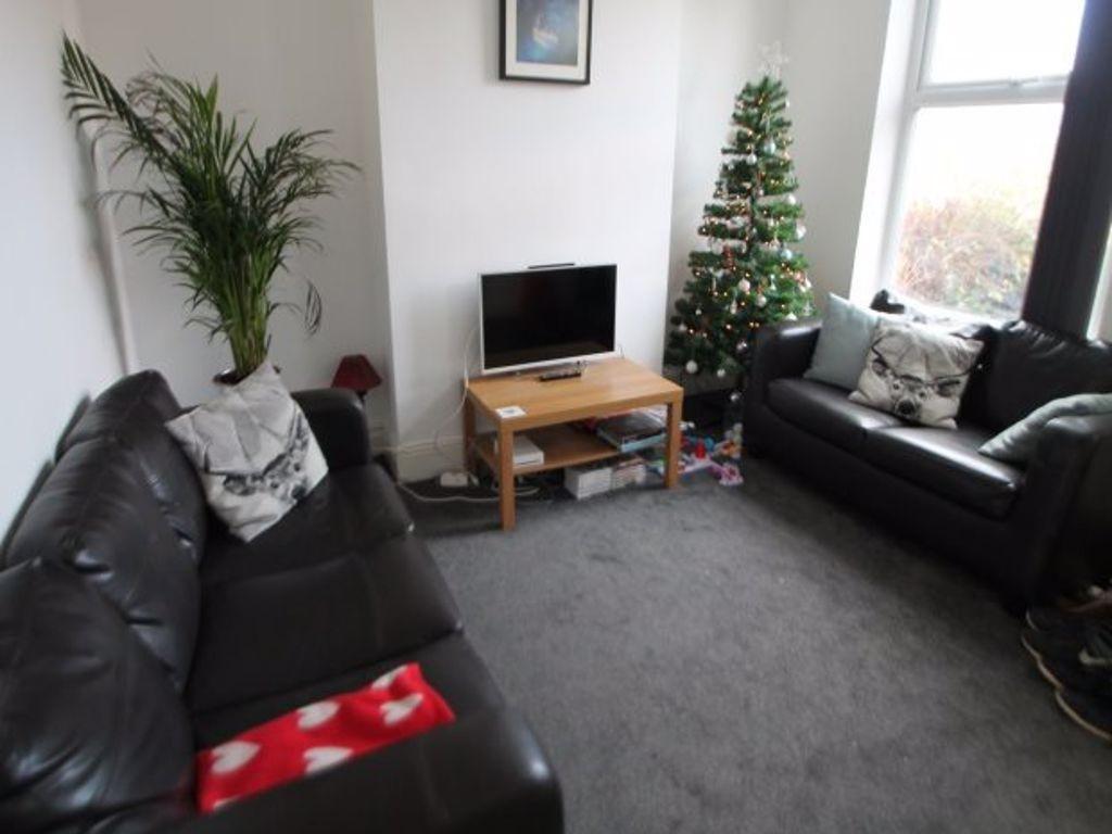 A modern and cozy living room featuring two bla...
