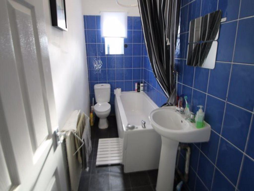 A clean and well-maintained bathroom featuring ...