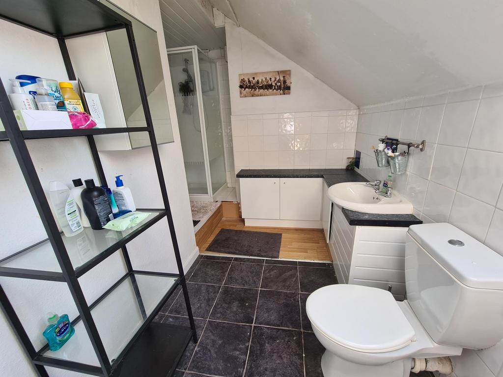 A bright and clean bathroom featuring modern fi...
