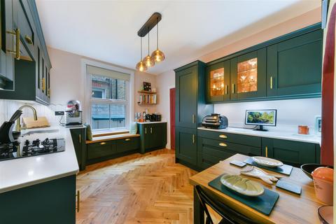 29 Briscoe Road, London, SW19 2AH