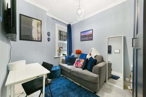 29 Briscoe Road, London, SW19 2AH