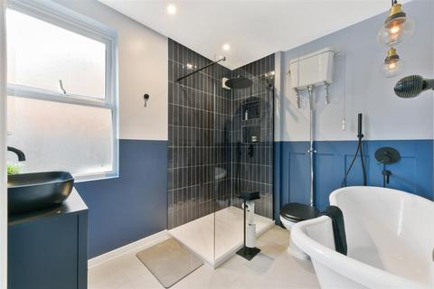 29 Briscoe Road, London, SW19 2AH