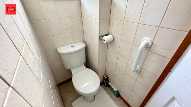 A clean and functional bathroom featuring a sta...