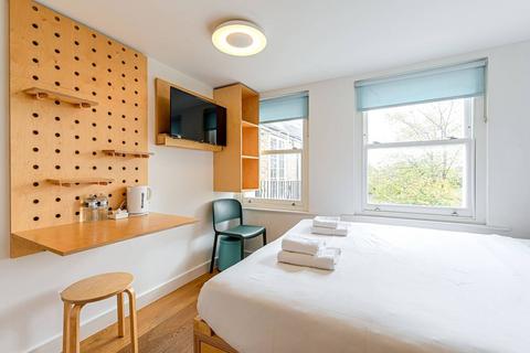 Studio to rent, Philbeach Gardens, Earls Court, London, SW5