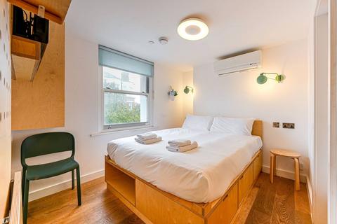 Studio to rent, Philbeach Gardens, Earls Court, London, SW5
