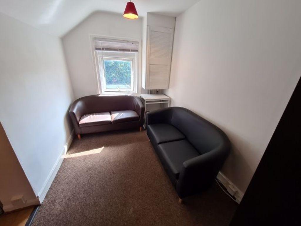 A cozy living room featuring two comfortable so...